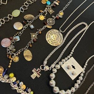 Assorted lot of silver and beaded jewelry: necklaces, bracelets, and earrings